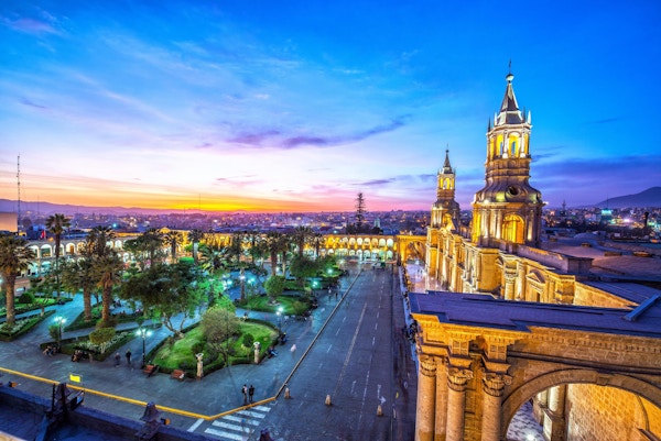 Night falling on the Plaza de Armas in the historic center of Arequipa, Peru